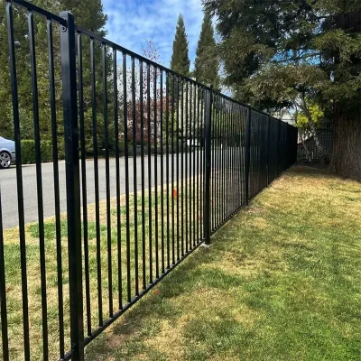 galvanized steel biasable fence near road