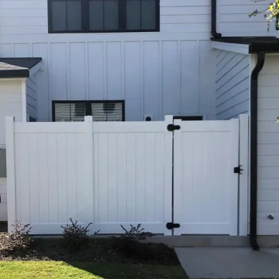 White Single Swing Vinyl Gate in Residential Area