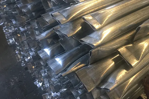 Galvanized pipe cutting and extrusion